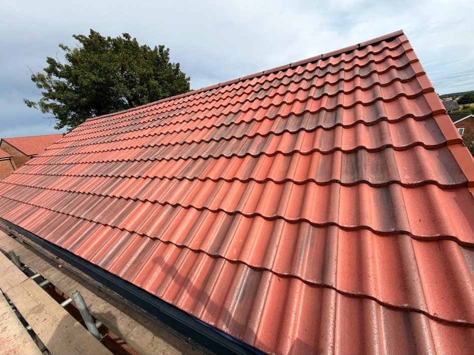 Brand new full re-roof with all new latts and felt, finished in new Old English Marley Mendip tiles